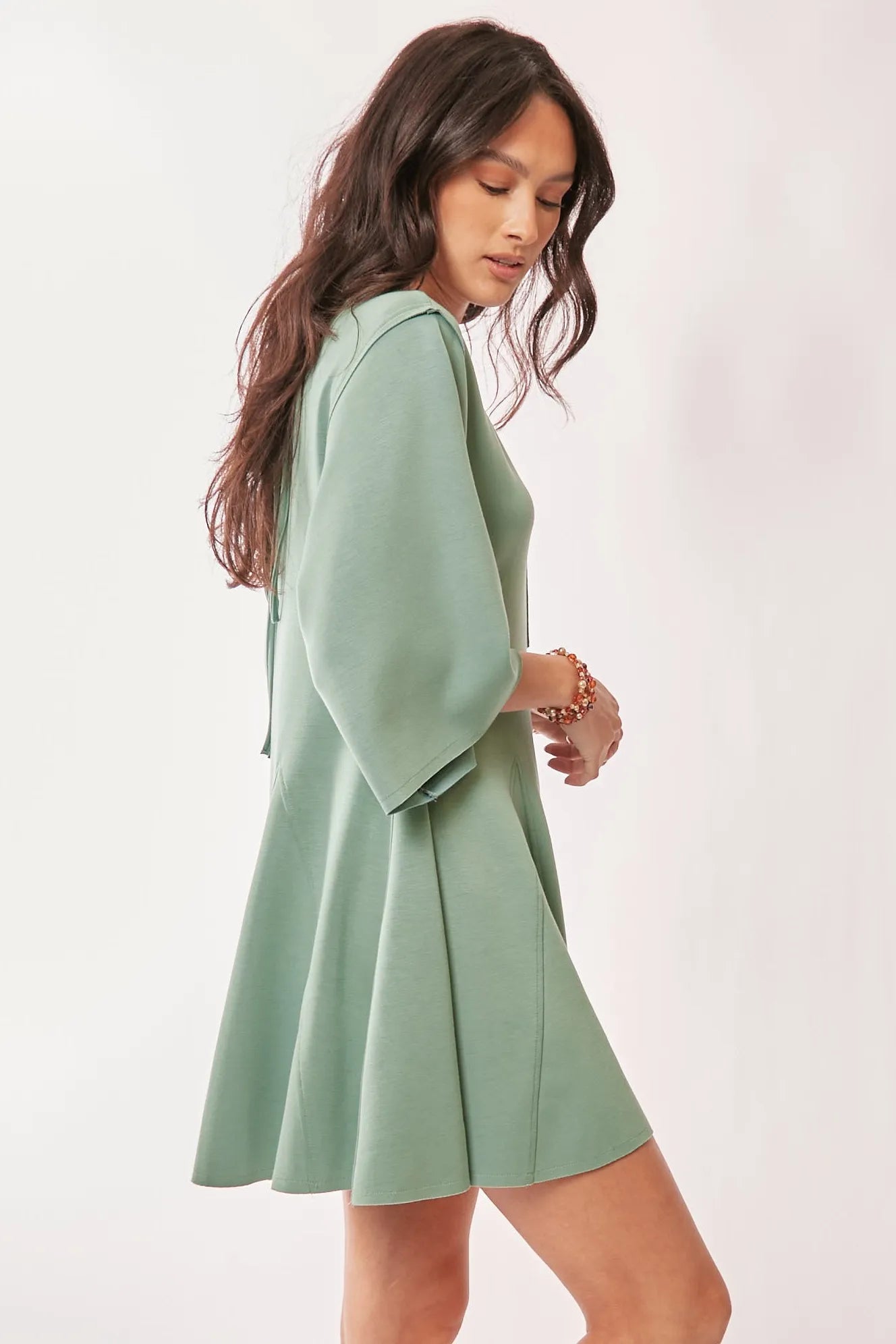 Image of Davi & Dani Solid Draped Sleeve Ties Back Skort Romper | Queeble.shop