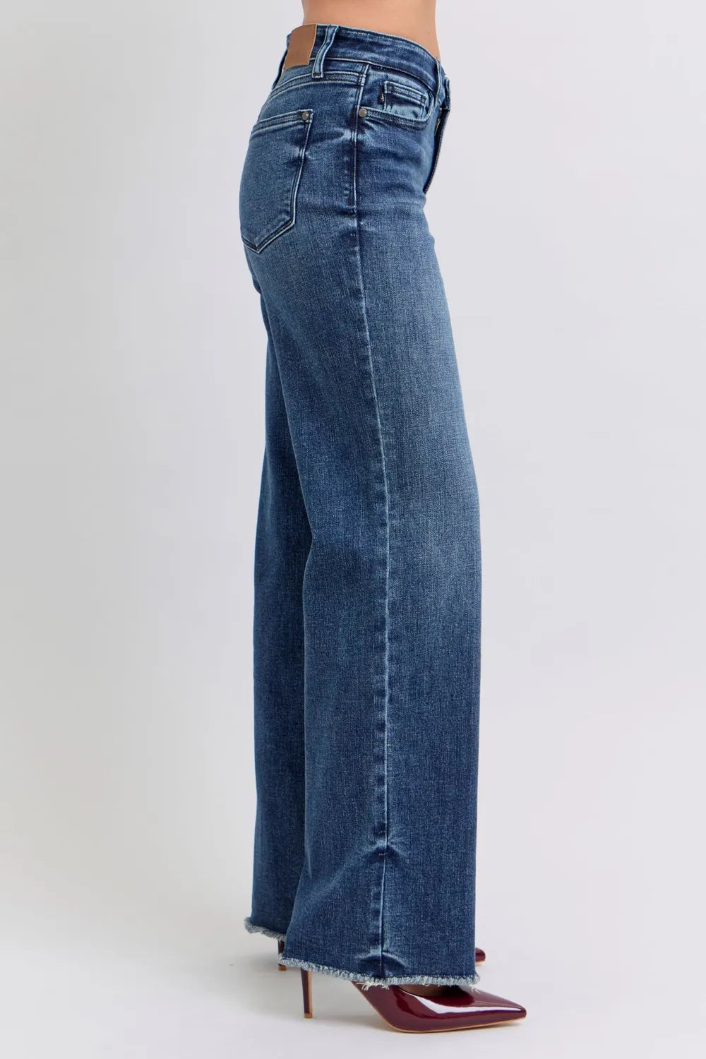 Image of Judy Blue Full Size Raw Hem Mid Rise Jeans | Queeble.shop