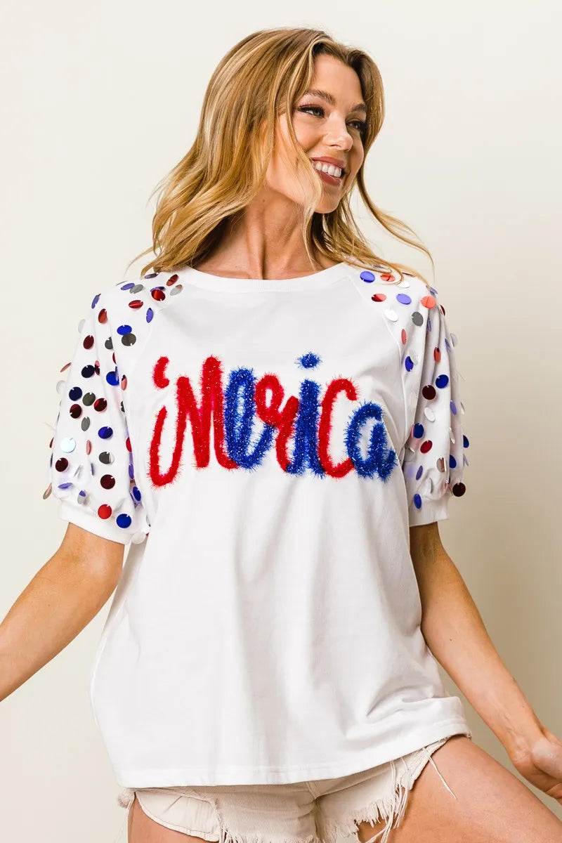 Image of BiBi Metallic Letter Spangle Raglan Puff Sleeve Top | Queeble.shop