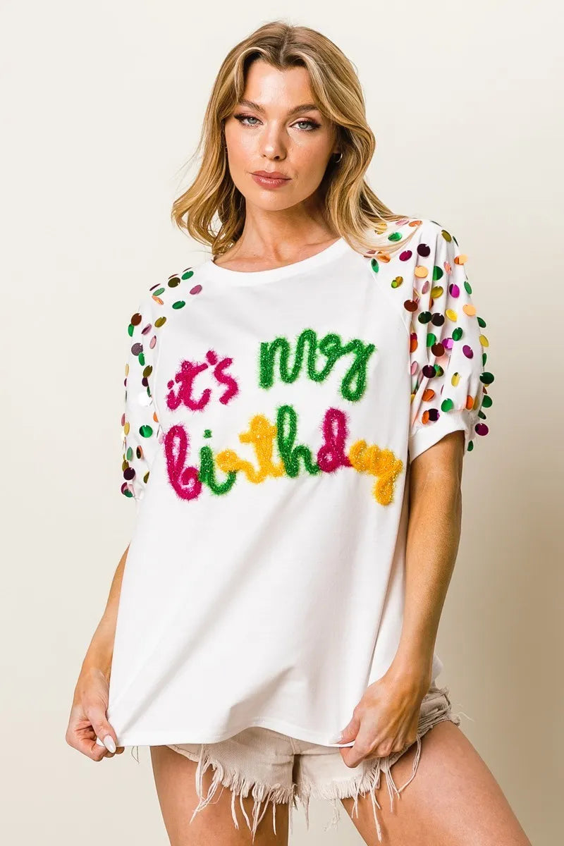 Image of BiBi Metallic Letter Spangle Raglan Puff Sleeve Top | Queeble.shop