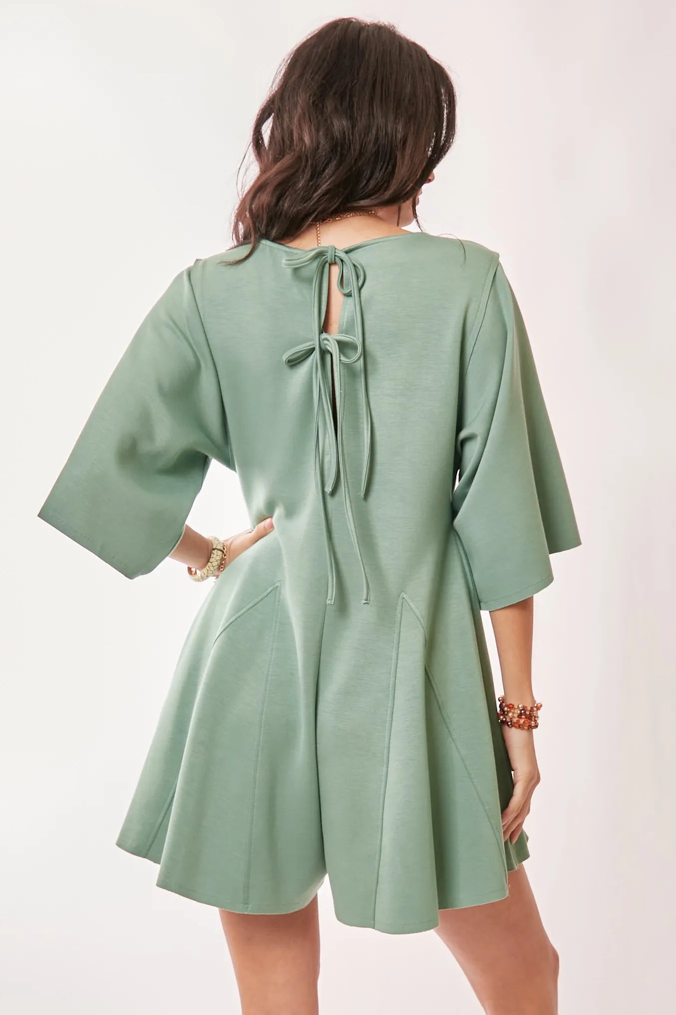 Image of Davi & Dani Solid Draped Sleeve Ties Back Skort Romper | Queeble.shop