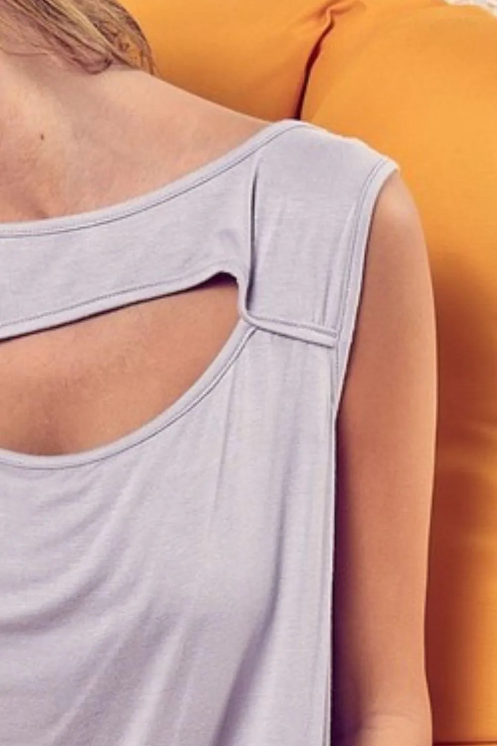 Image of BiBi Rayon Span Knit With Cut Out Front Sleeveless Top | Queeble.shop