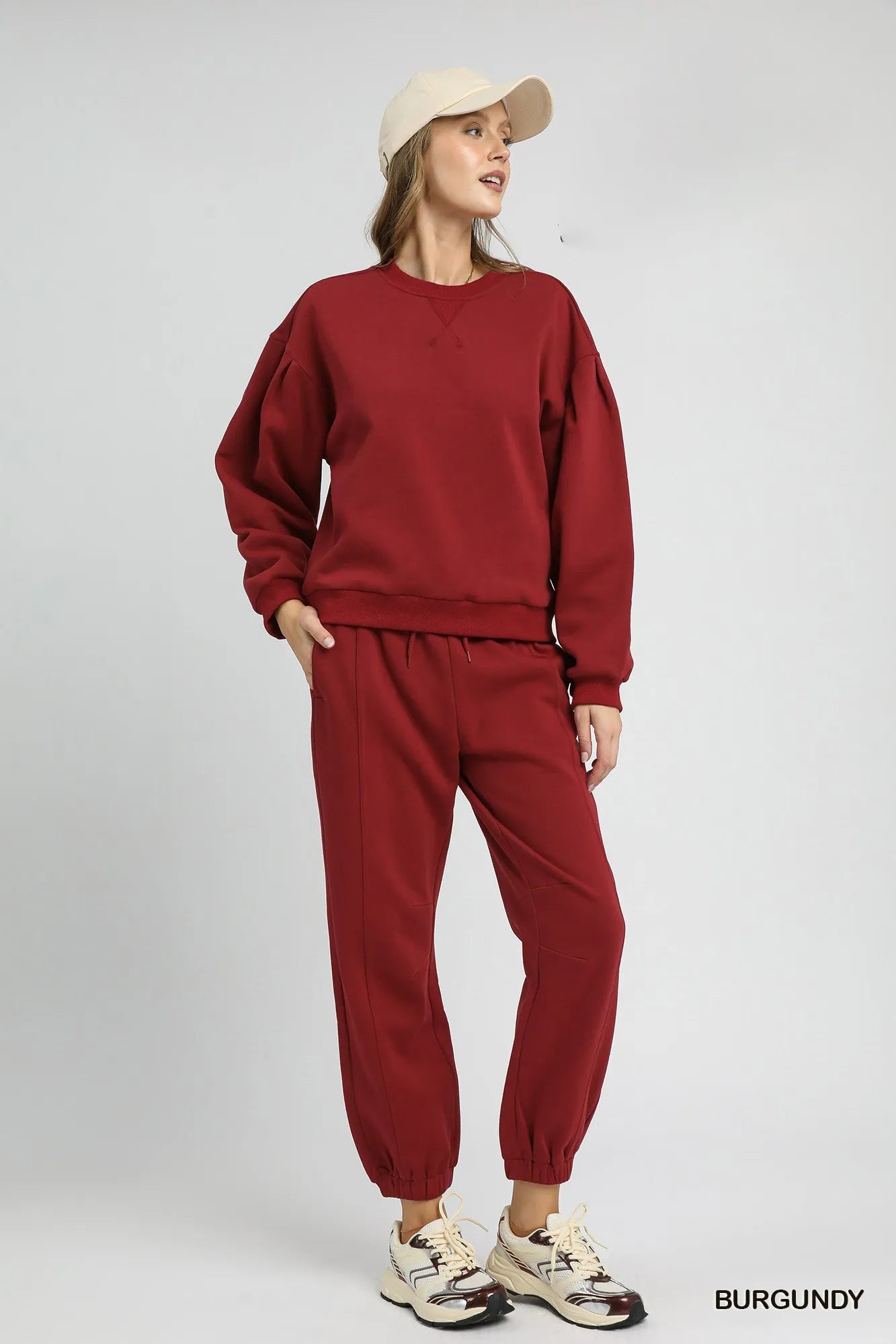 Image of Umgee Round Neck Sweatshirt with Pleated Detail | Queeble.shop