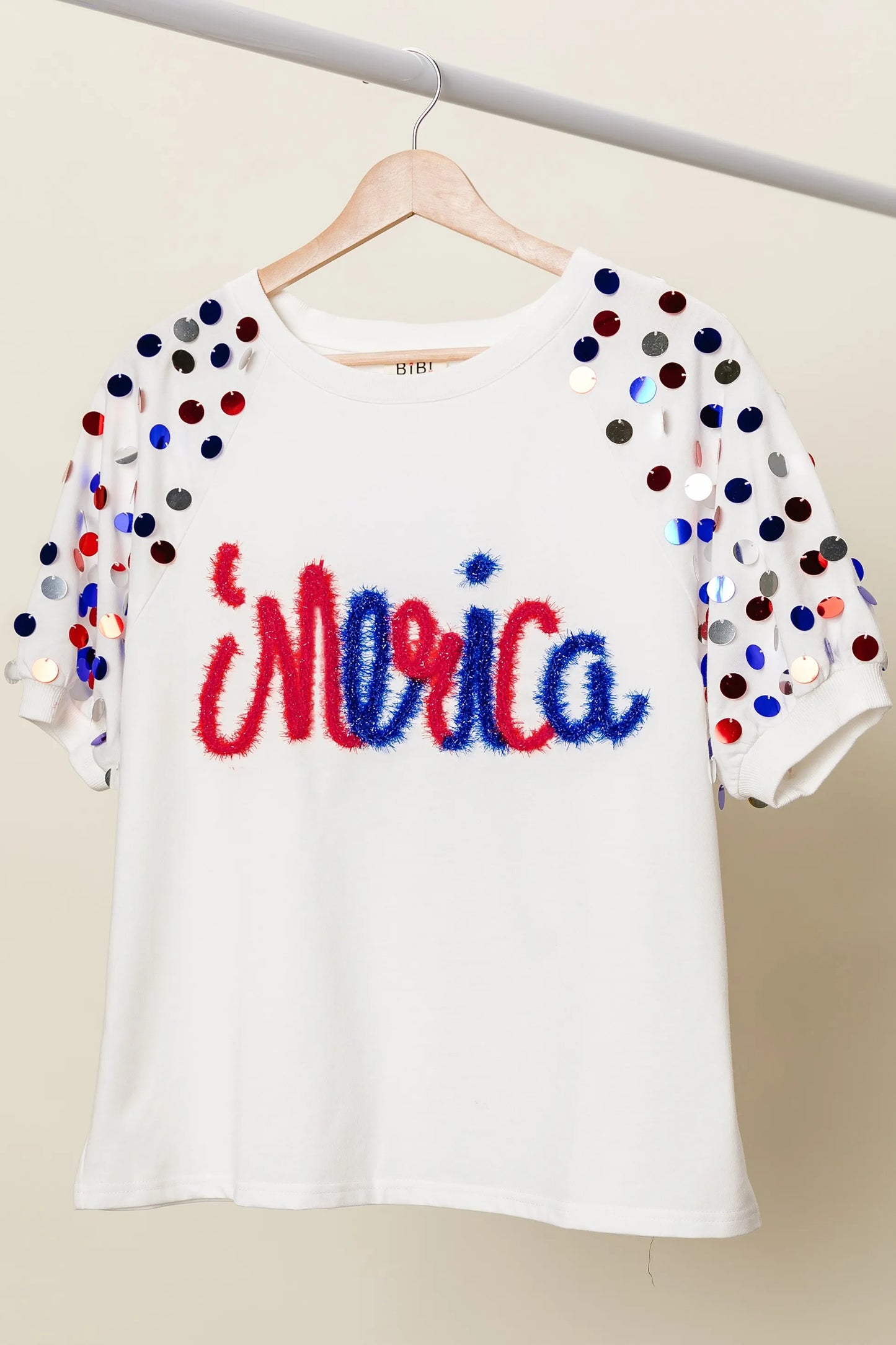 Image of BiBi Metallic Letter Spangle Raglan Puff Sleeve Top | Queeble.shop