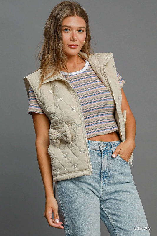 Image of Umgee Sleeveless Quilted Vest with Bow Details | Queeble.shop
