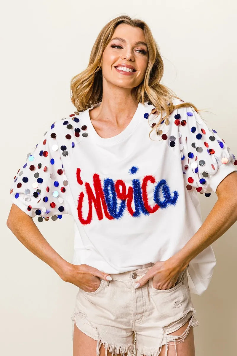 Image of BiBi Metallic Letter Spangle Raglan Puff Sleeve Top | Queeble.shop