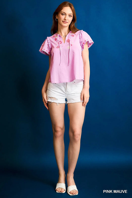 Image of Umgee Floral Embroidered Tie Neck Short Sleeve Blouse | Queeble.shop