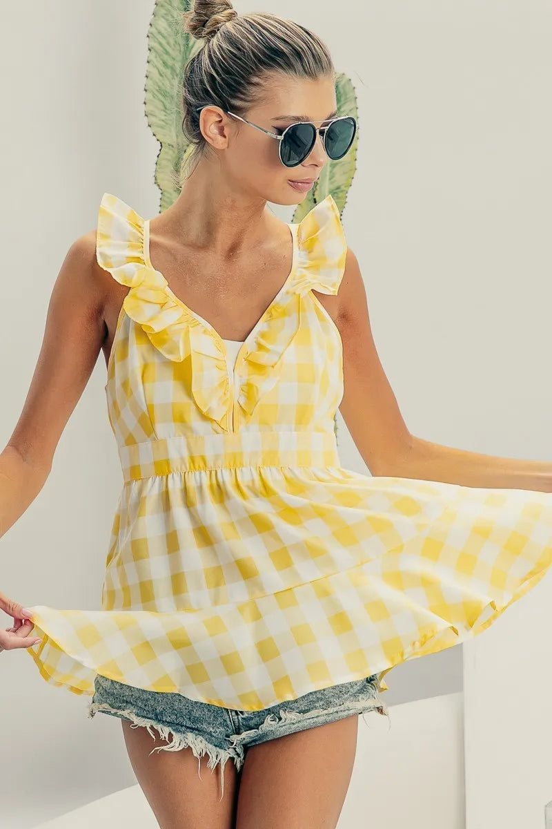 Image of BiBi Ruffled Neckline Sleeveless Check Plaid Peplum Top | Queeble.shop