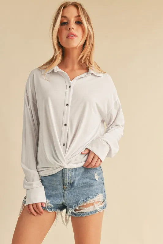Image of Aemi + Co Twisted Hemline Button Detail Collared Neck Top | Queeble.shop