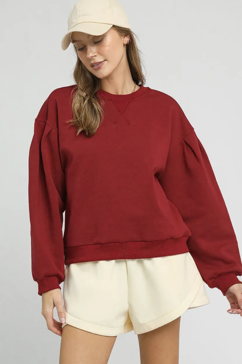 Image of Umgee Round Neck Sweatshirt with Pleated Detail | Queeble.shop