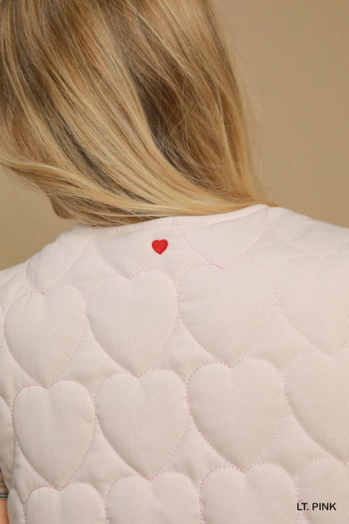 Image of Umgee Heart Quilted Tie-Front Vest | Queeble.shop