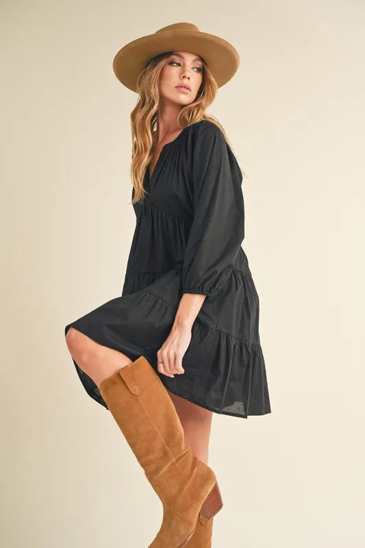 Image of Aemi + Co Notched Balloon Sleeve Tiered Mini Dress | Queeble.shop