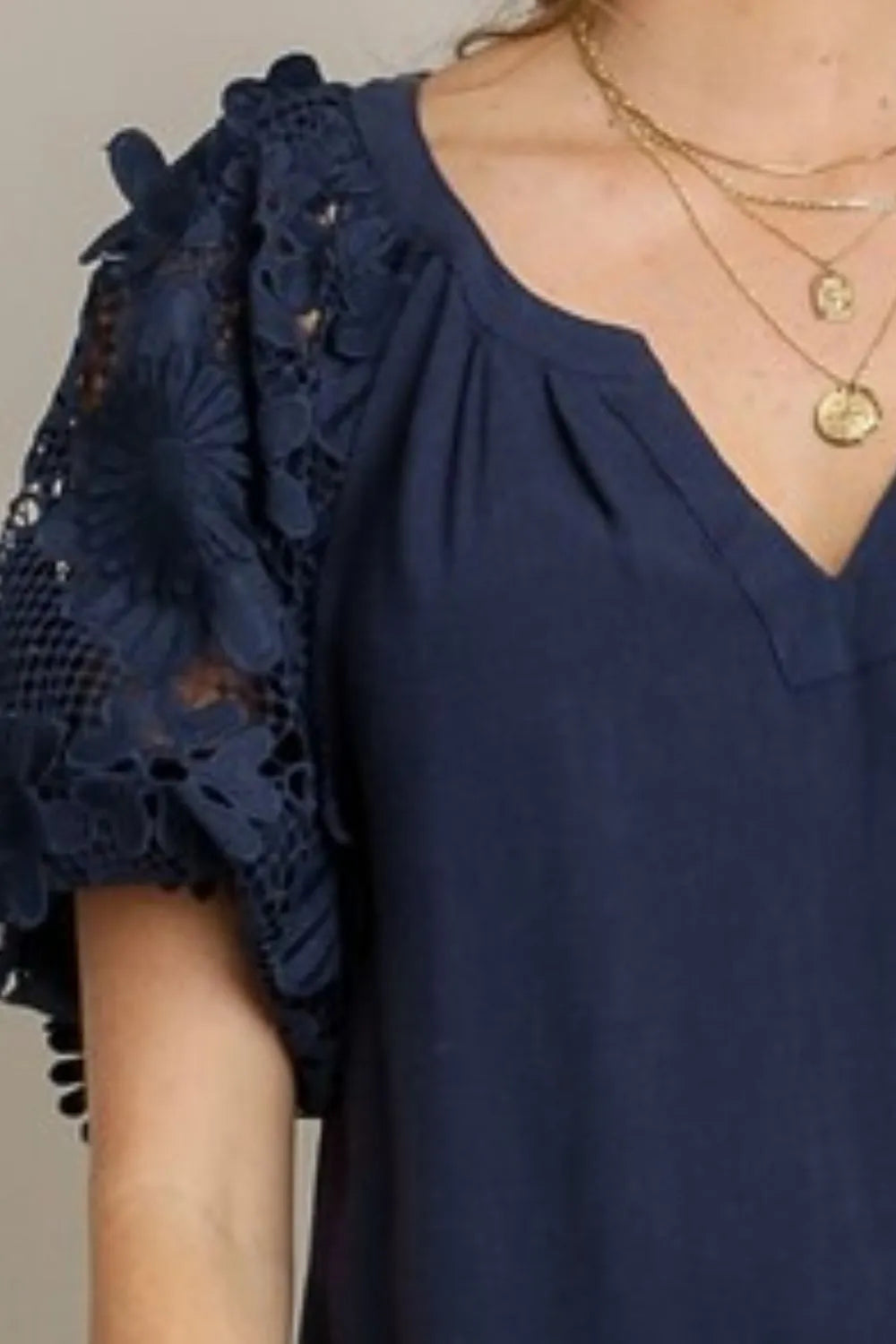 Image of Umgee Full Size French Terry Boxy Cut Top with 3D Floral Sleeve Plus Size | Queeble.shop