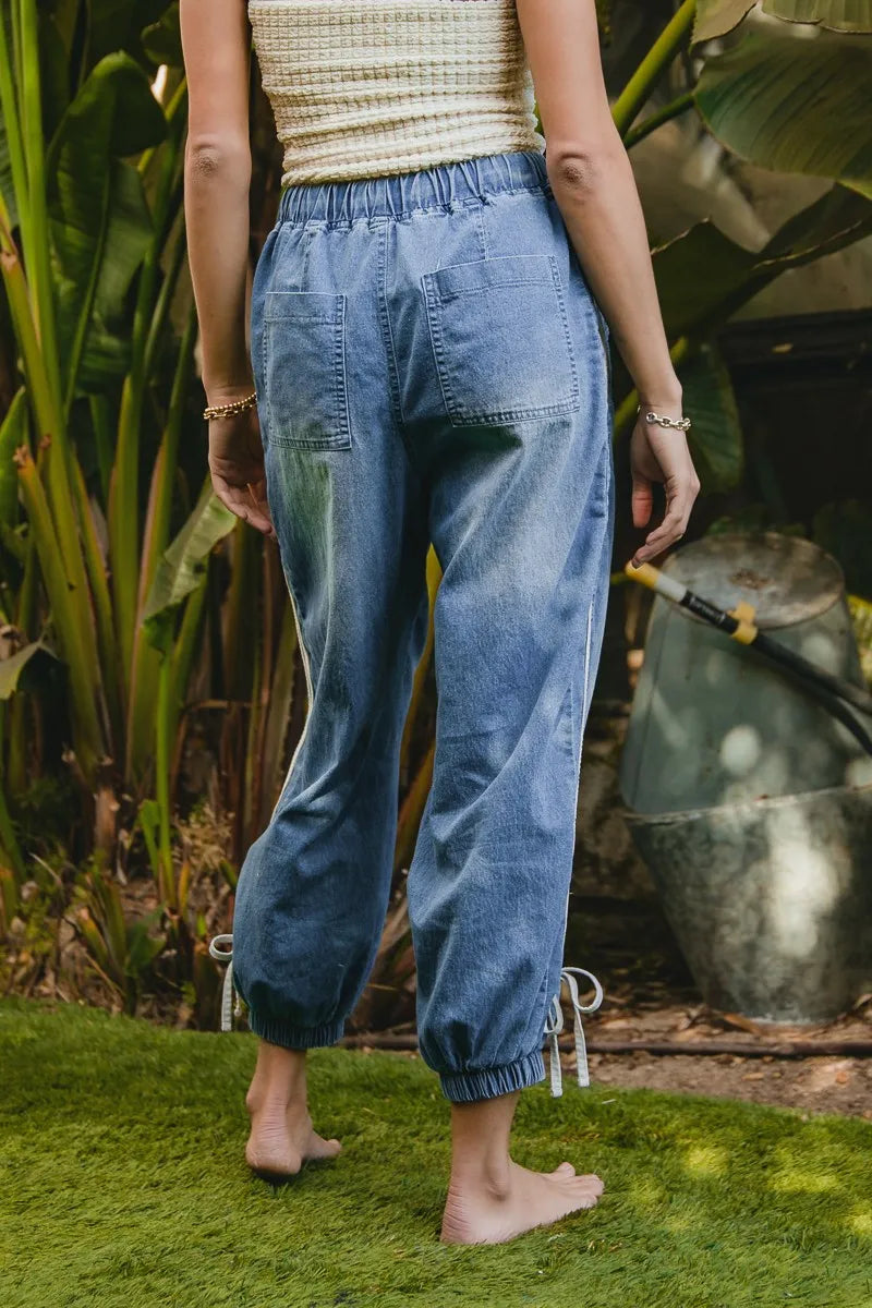 Image of BiBi Striped Tape Details With Bot Tied Point Elastic Waist Jeans | Queeble.shop