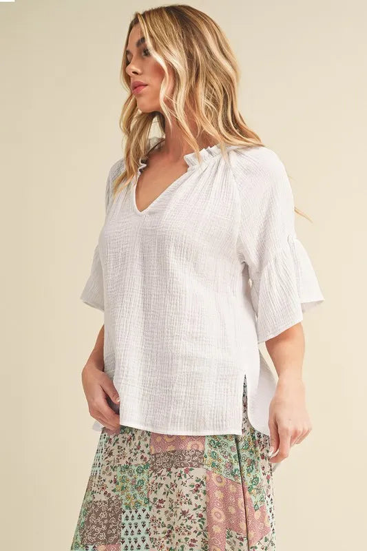 Image of Aemi + Co Side Slit Notched Ruffled Half Sleeve Blouse | Queeble.shop