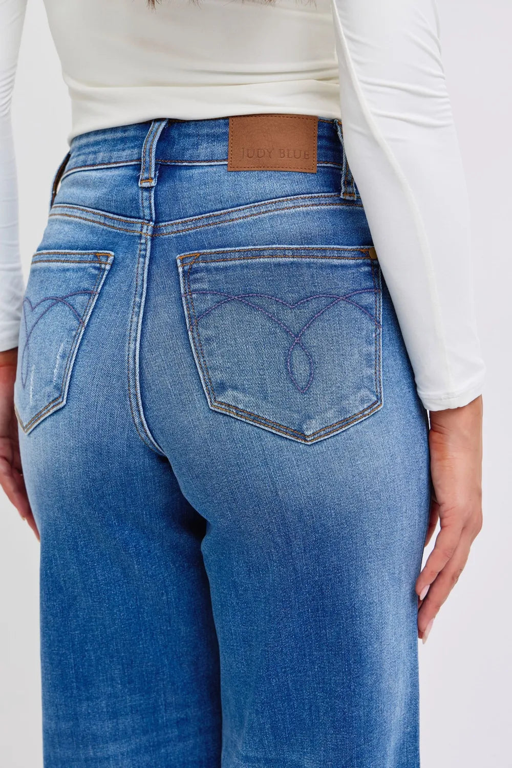Image of Judy Blue Full Size Distressed High Waist Wide Leg Jeans | Queeble.shop