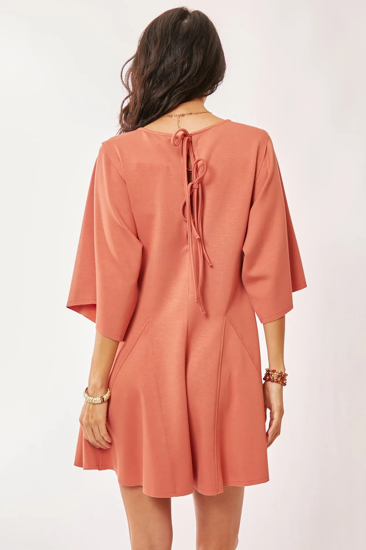Image of Davi & Dani Solid Draped Sleeve Ties Back Skort Romper | Queeble.shop