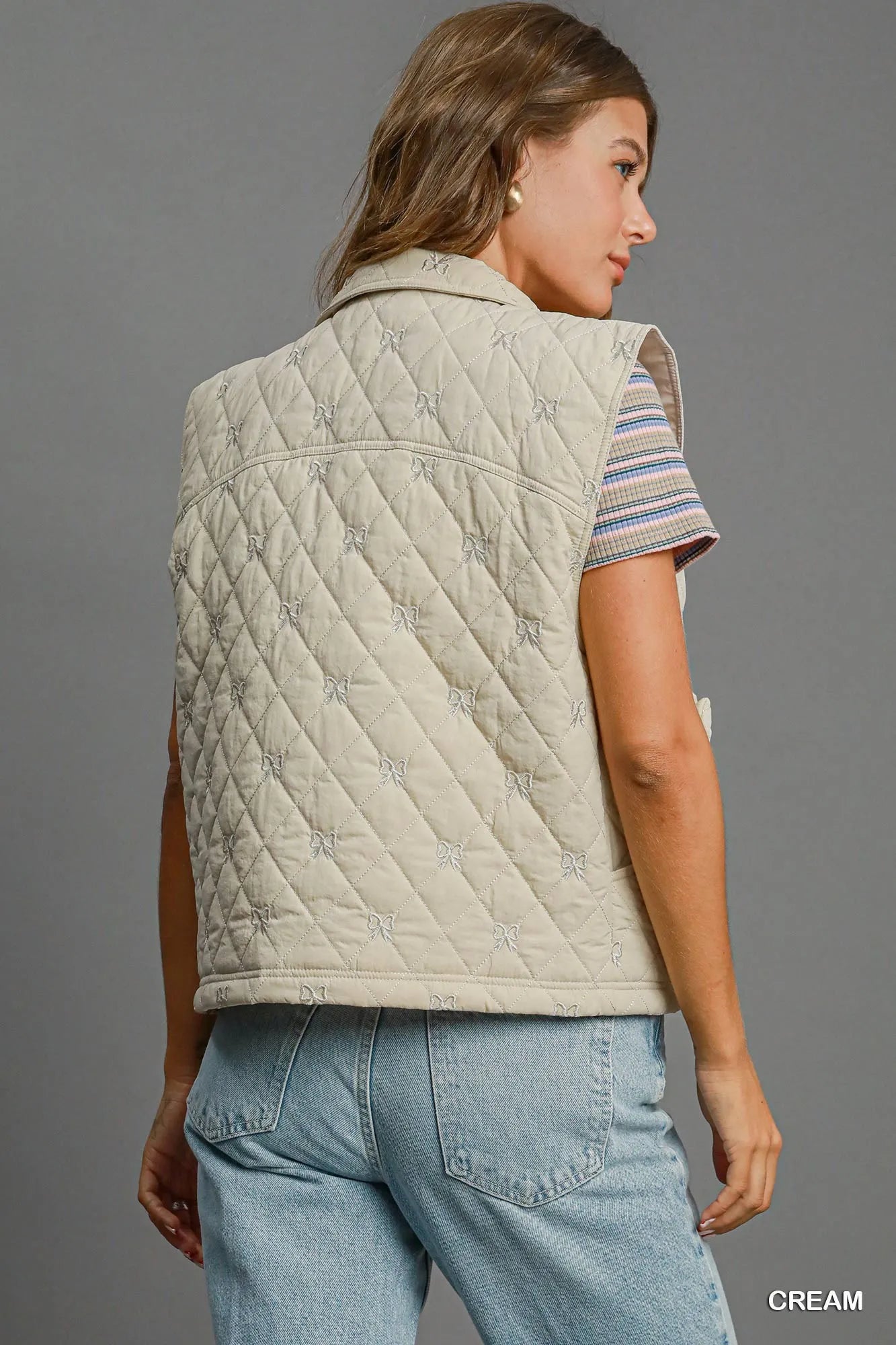 Image of Umgee Sleeveless Quilted Vest with Bow Details | Queeble.shop