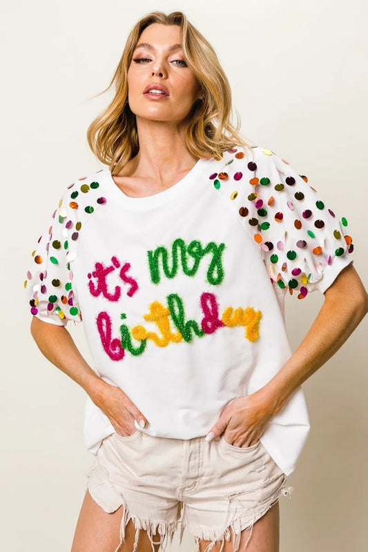 Image of BiBi Metallic Letter Spangle Raglan Puff Sleeve Top | Queeble.shop