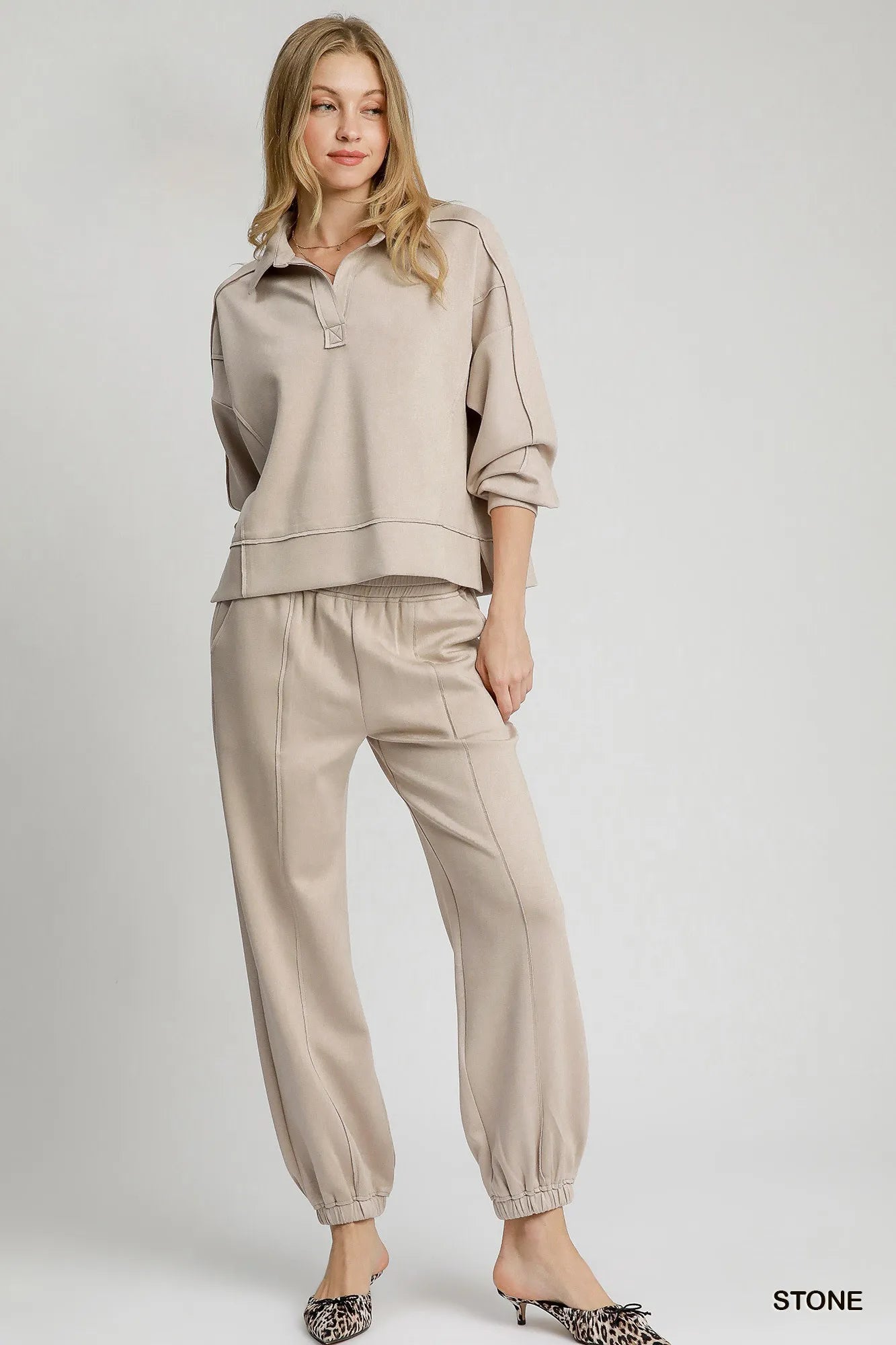 Image of Umgee Exposed Seam Long Sleeve Polo Top with Side Slit | Queeble.shop
