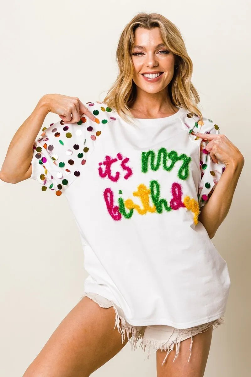Image of BiBi Metallic Letter Spangle Raglan Puff Sleeve Top | Queeble.shop