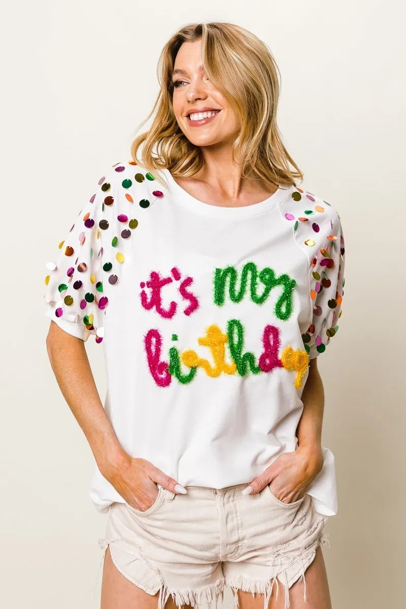 Image of BiBi Metallic Letter Spangle Raglan Puff Sleeve Top | Queeble.shop