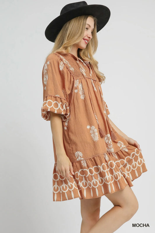 Image of Umgee Boarder Print Tassel Tie Neck Mini Dress | Queeble.shop