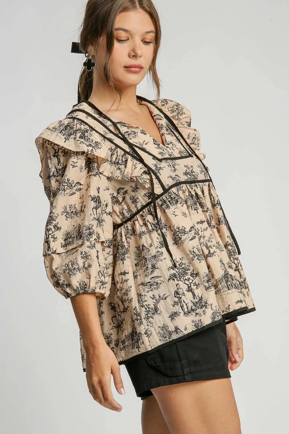 Image of Umgee Ruffled Tie Neck Puff Sleeve Babydoll Blouse | Queeble.shop