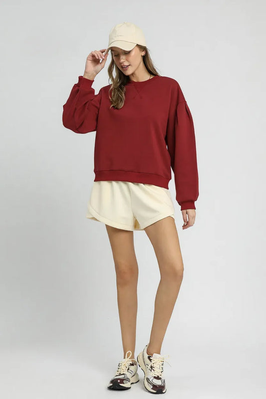 Image of Umgee Round Neck Sweatshirt with Pleated Detail | Queeble.shop