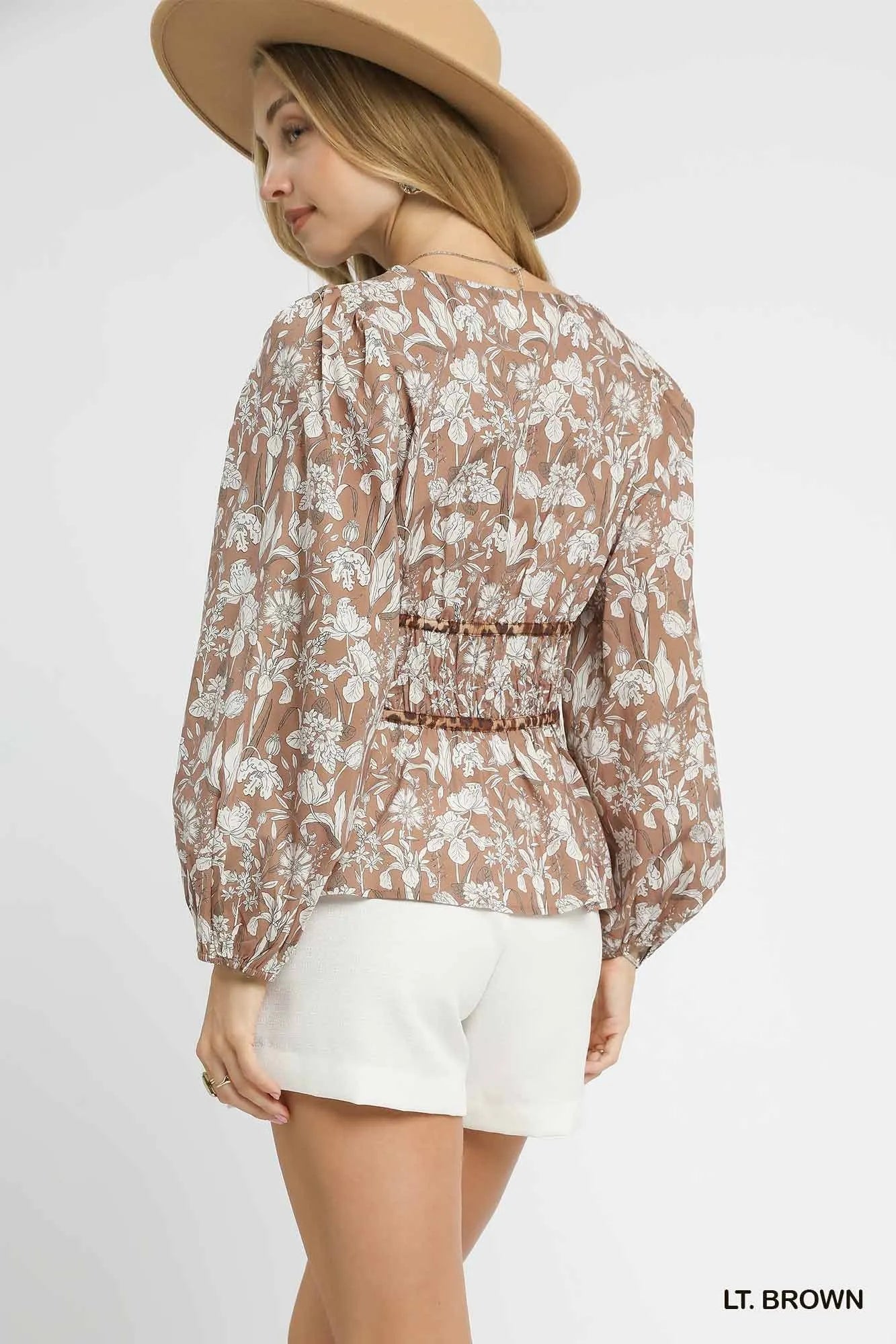 Image of Umgee Floral Smocked Peplum Blouse with Tie Detail | Queeble.shop