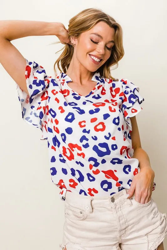 Image of BiBi Leopard Notched Ruffled Cap Sleeve Blouse | Queeble.shop