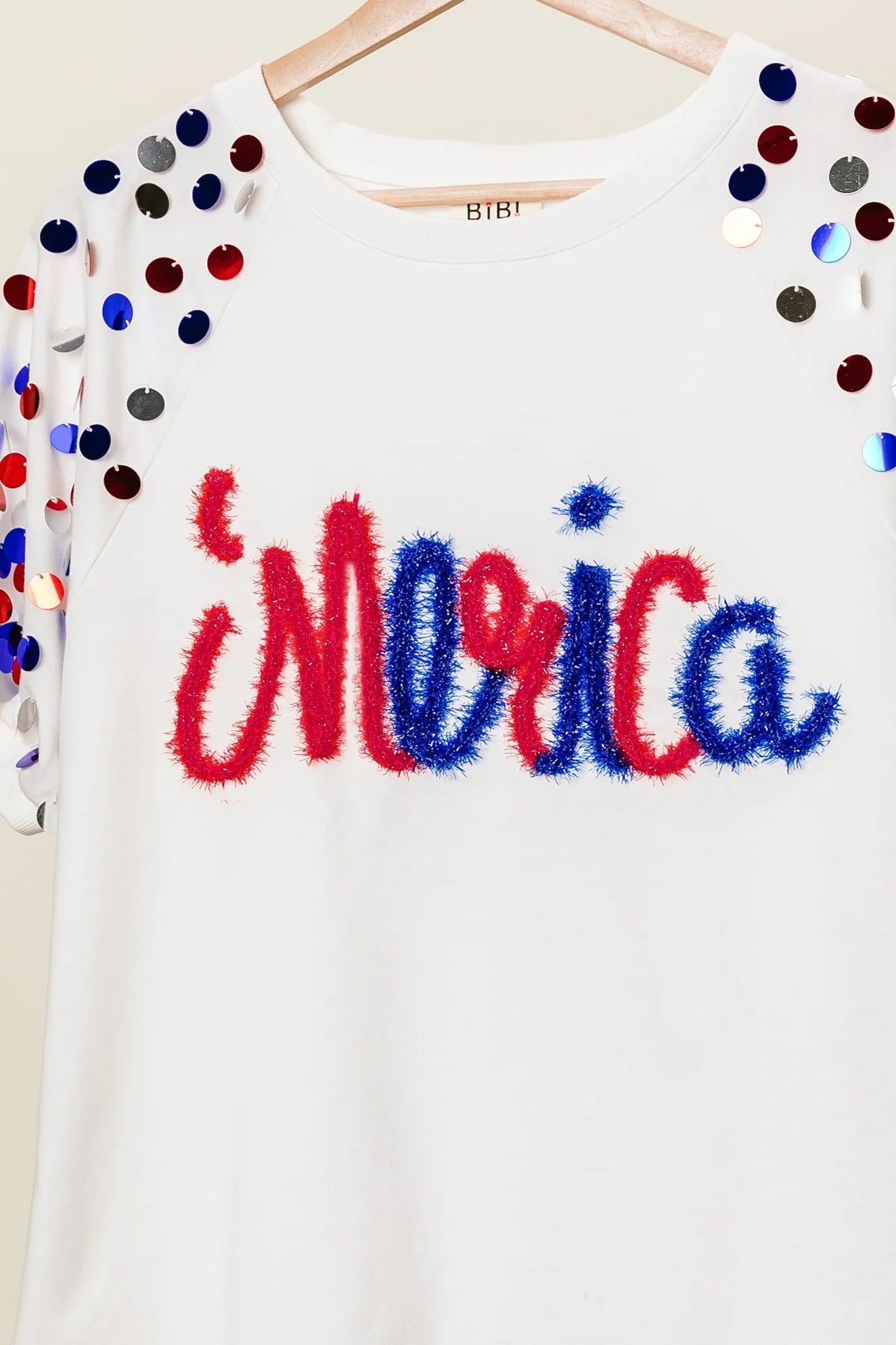 Image of BiBi Metallic Letter Spangle Raglan Puff Sleeve Top | Queeble.shop