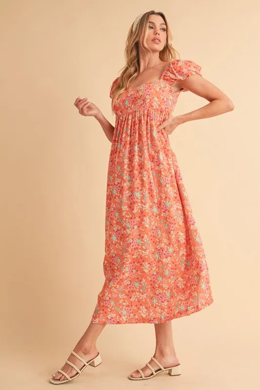 Image of Aemi + Co Cutout Back Floral Square Neck Puff Sleeve Midi Dress | Queeble.shop