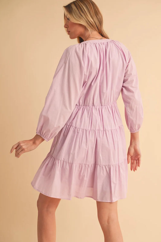 Image of Aemi + Co Notched Balloon Sleeve Tiered Mini Dress | Queeble.shop