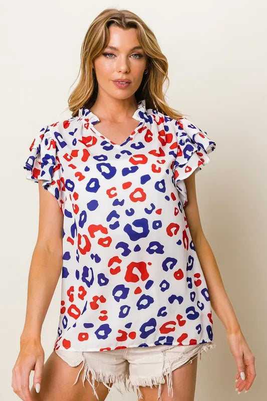 Image of BiBi Leopard Notched Ruffled Cap Sleeve Blouse | Queeble.shop