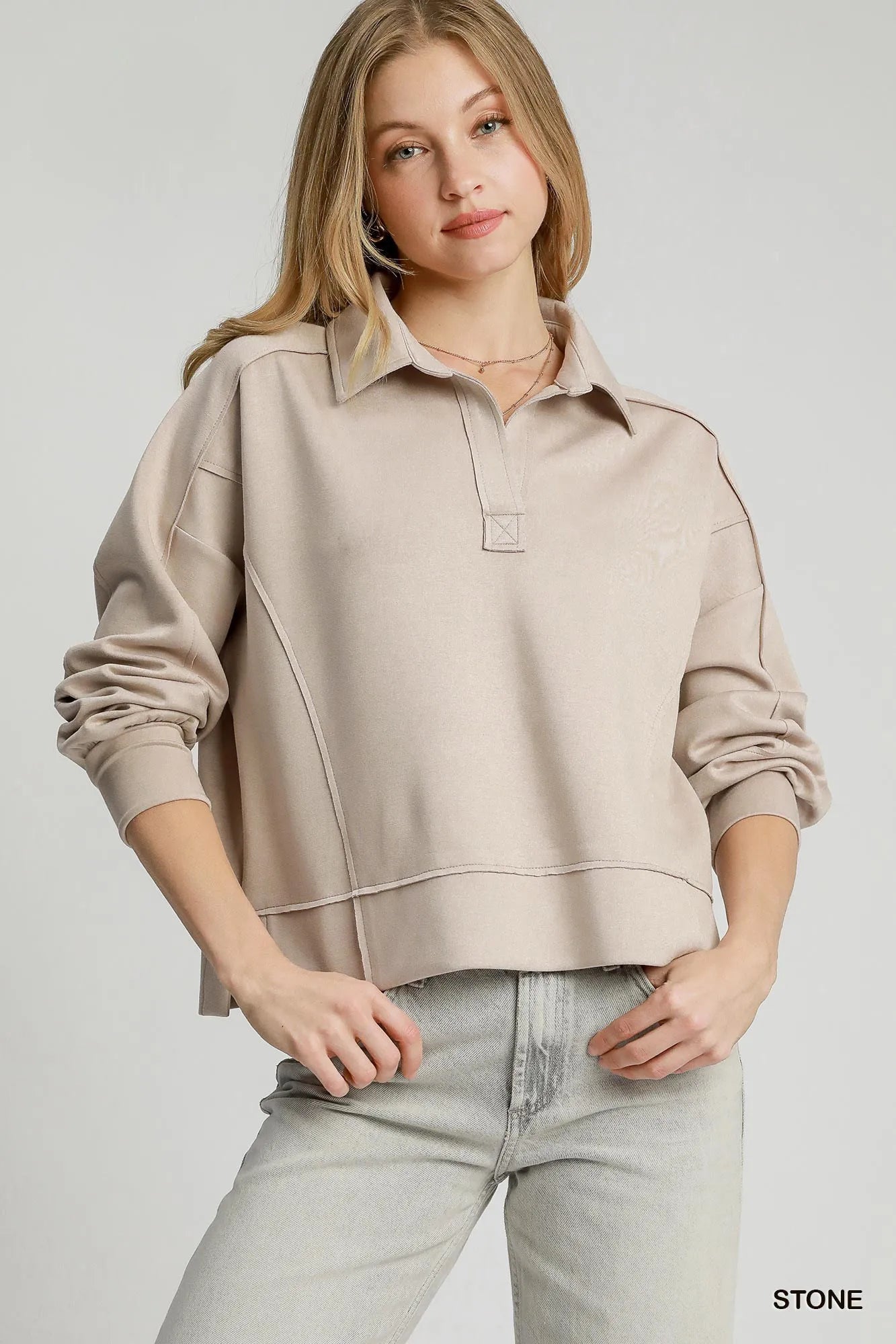 Image of Umgee Exposed Seam Long Sleeve Polo Top with Side Slit | Queeble.shop