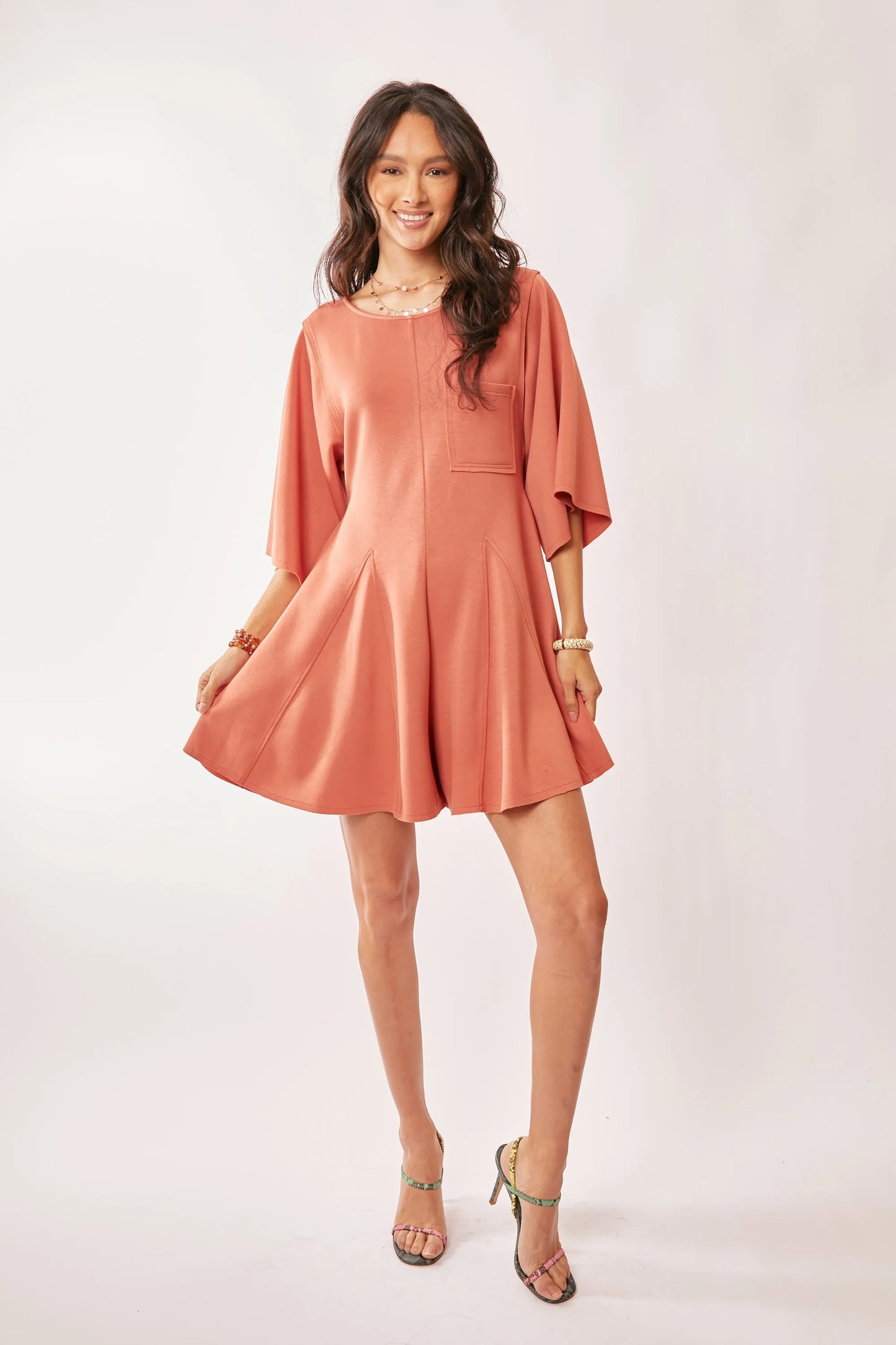 Image of Davi & Dani Solid Draped Sleeve Ties Back Skort Romper | Queeble.shop