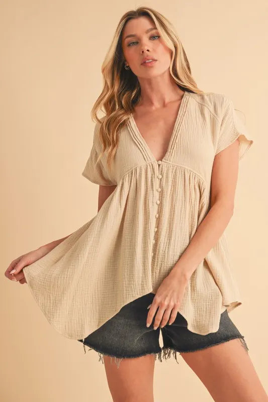 Image of Aemi + Co Tuck Detail V-Neck Short Sleeve Blouse | Queeble.shop