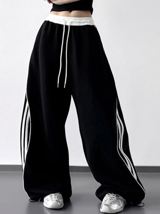 Image of Oversized Streetwear Pants with Side Stripes | Queeble.shop