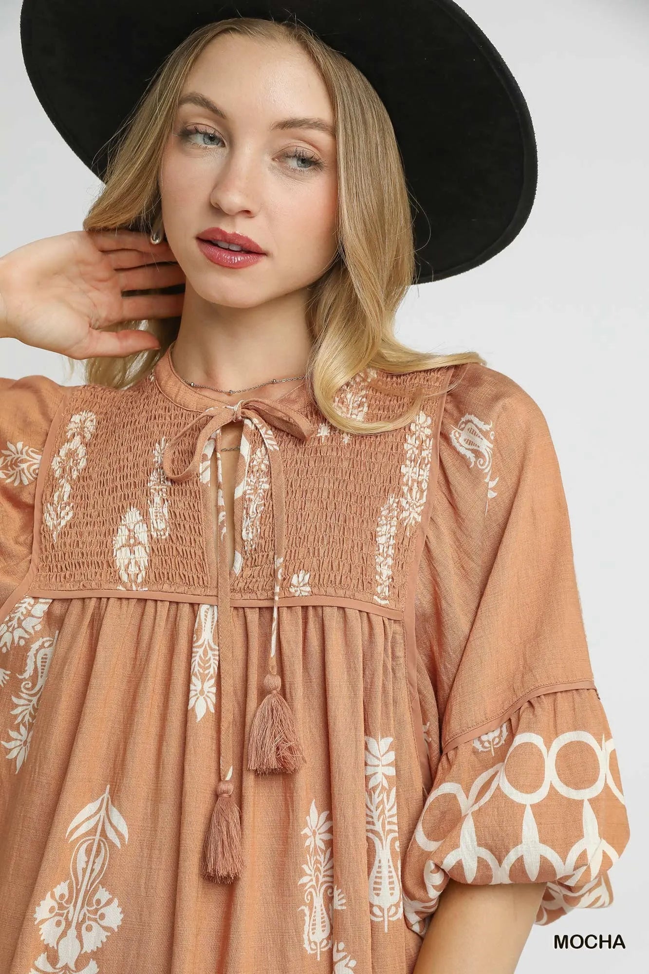 Image of Umgee Boarder Print Tassel Tie Neck Mini Dress | Queeble.shop