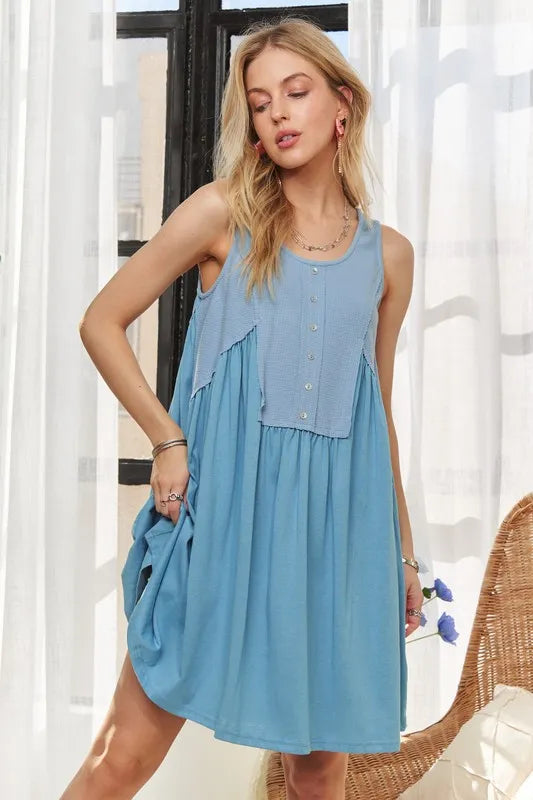 Image of ADORA Decorative Button Sleeveless Babydoll Dress | Queeble.shop