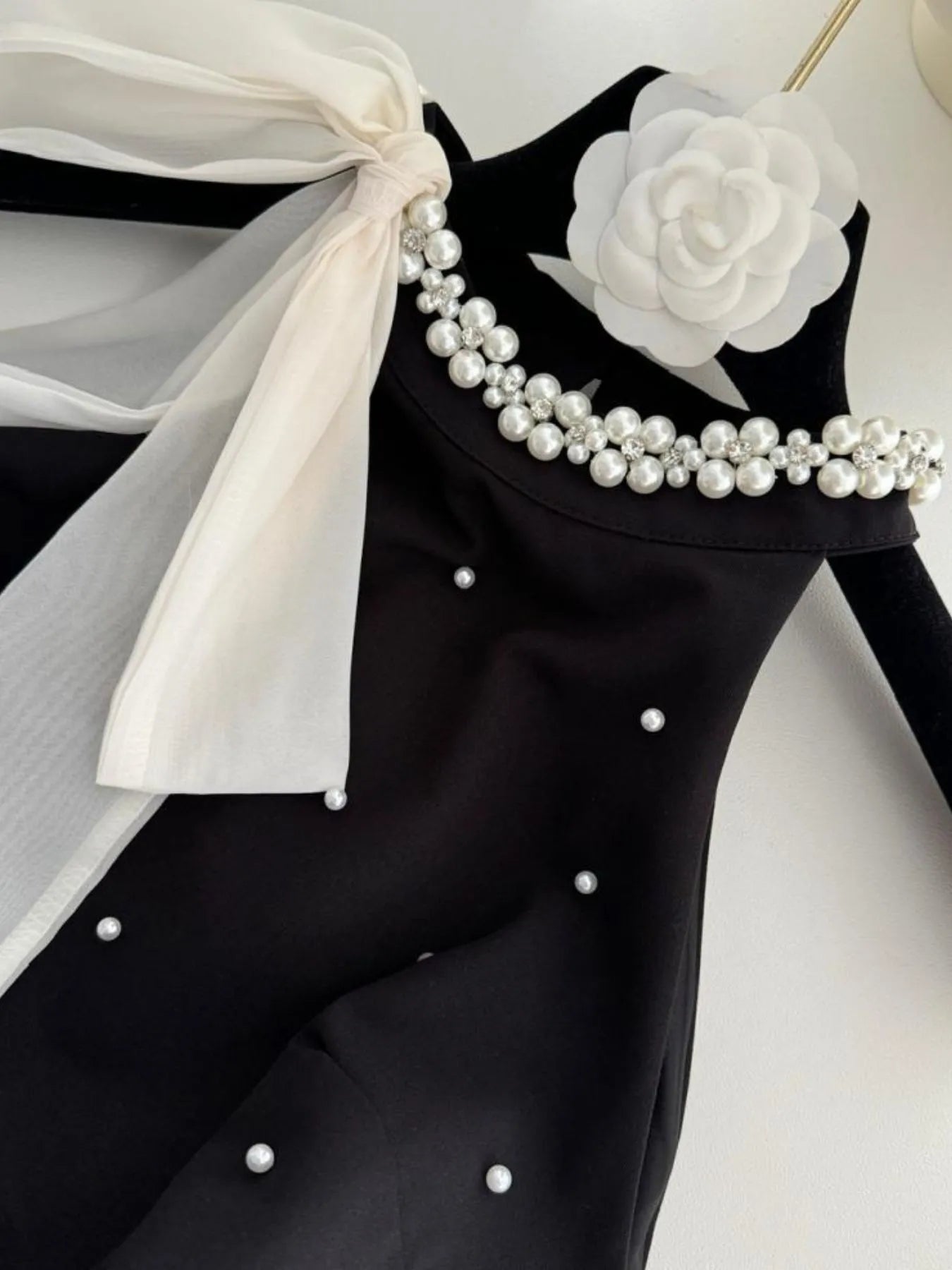 Image of Pearl Detail Sleeveless Mini Dress | Queeble.shop