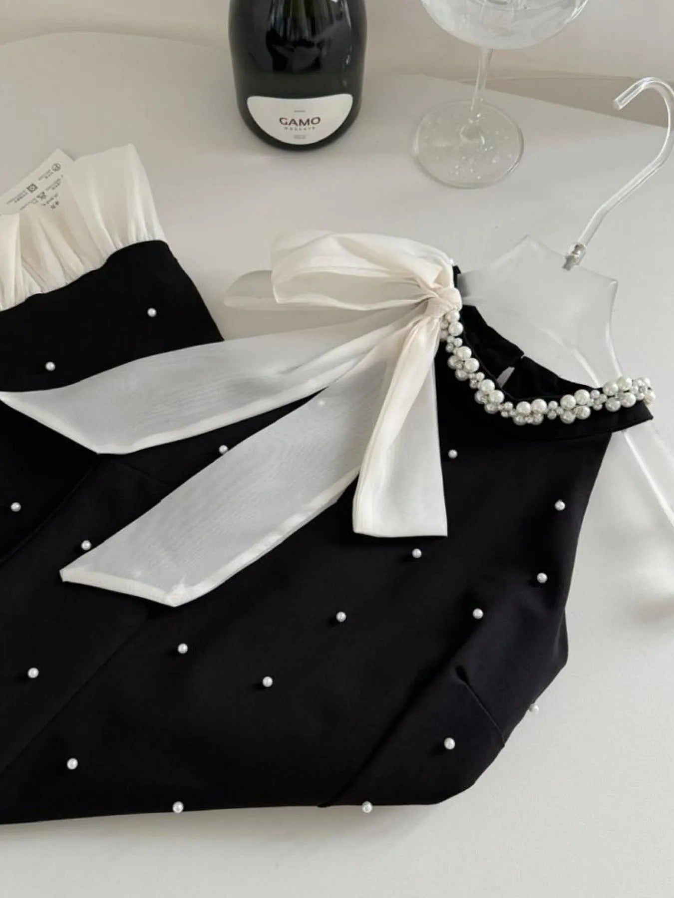 Image of Pearl Detail Sleeveless Mini Dress | Queeble.shop