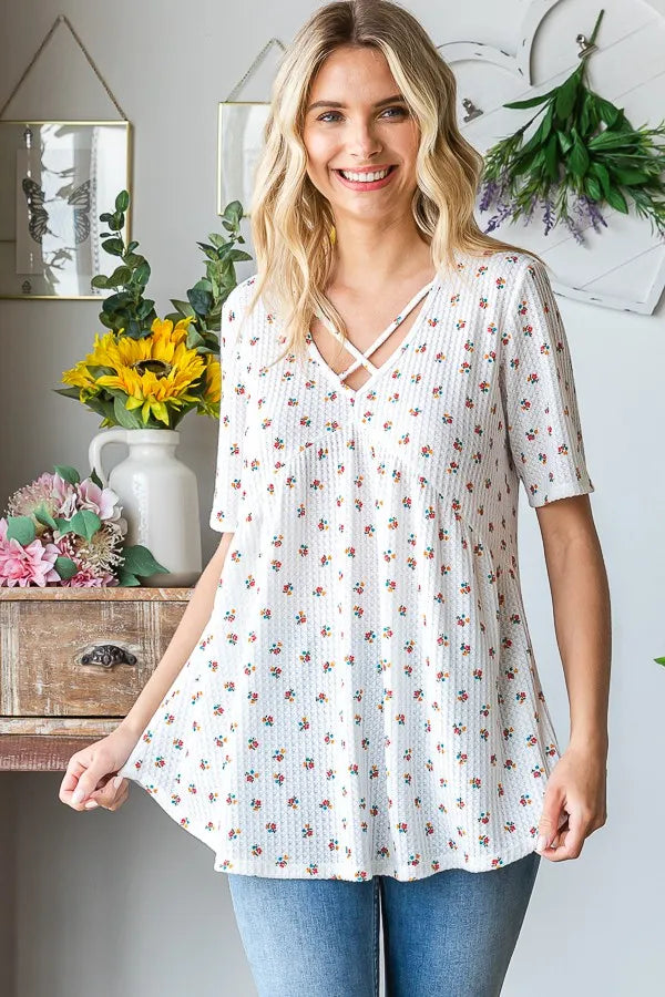 Image of Heimish Full Size Crisscross Ditsy Floral Babydoll Top Plus Size | Queeble.shop