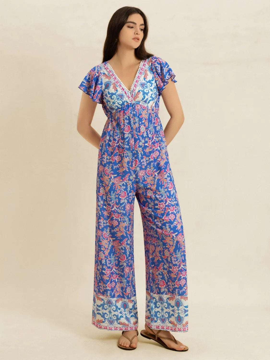 Image of Printed V-Neck Wide Leg Jumpsuit | Queeble.shop
