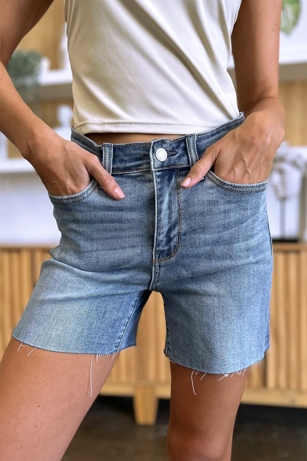 Image of Judy Blue Full Size High Waist Raw Hem Denim Shorts | Queeble.shop