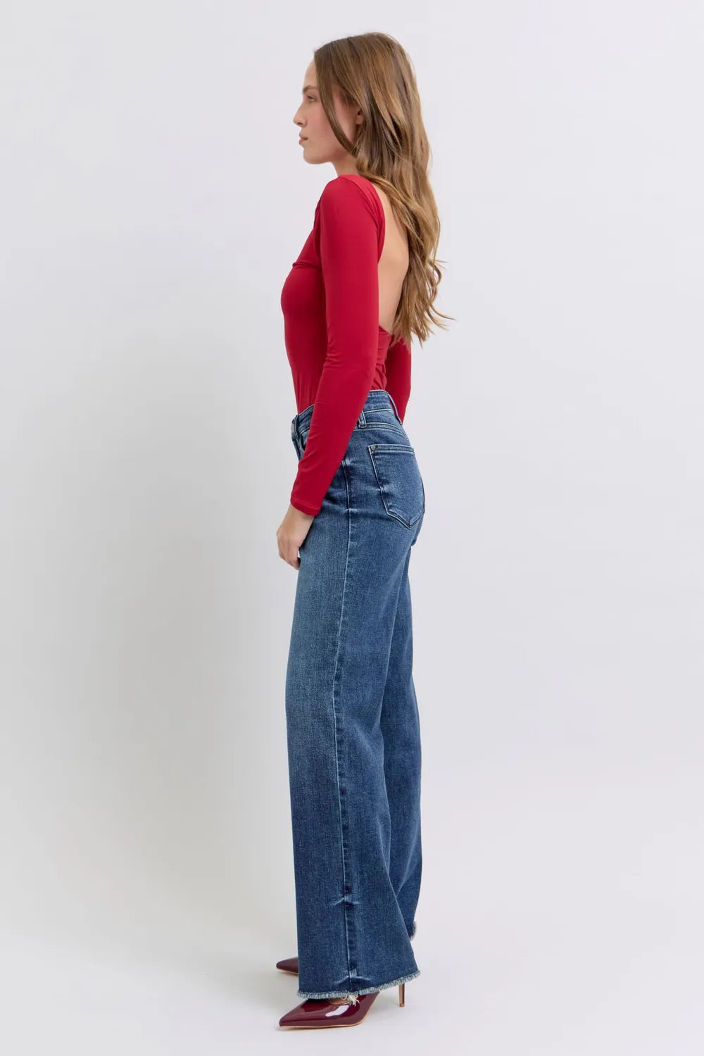 Image of Judy Blue Full Size Raw Hem Mid Rise Jeans | Queeble.shop