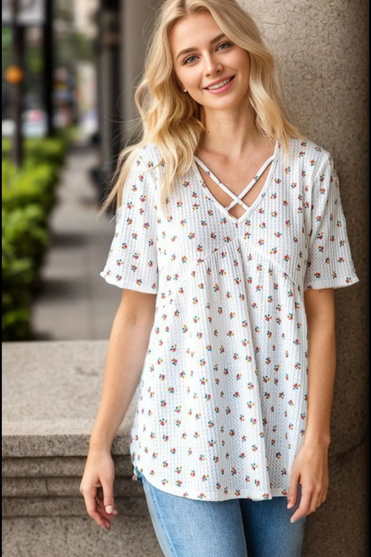 Image of Heimish Full Size Crisscross Ditsy Floral Babydoll Top Plus Size | Queeble.shop
