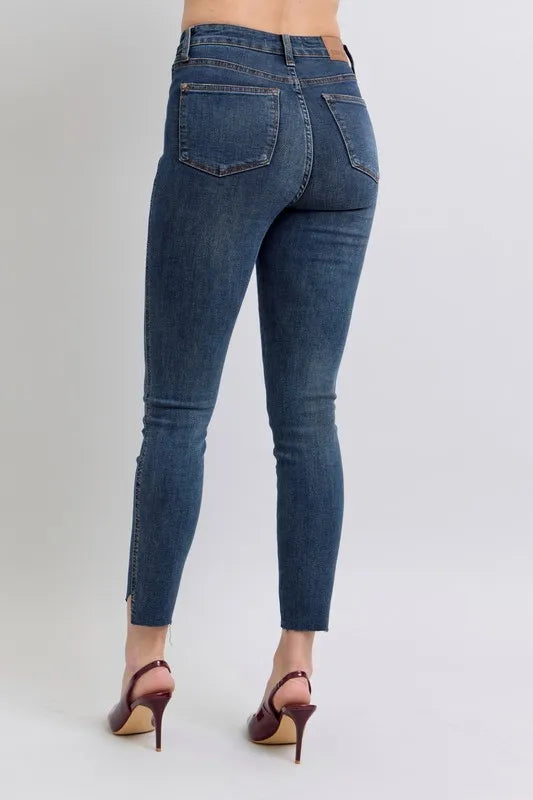 Image of Judy Blue Full Size High Waist Tummy Control Step Hem Skinny Jeans Plus Size | Queeble.shop
