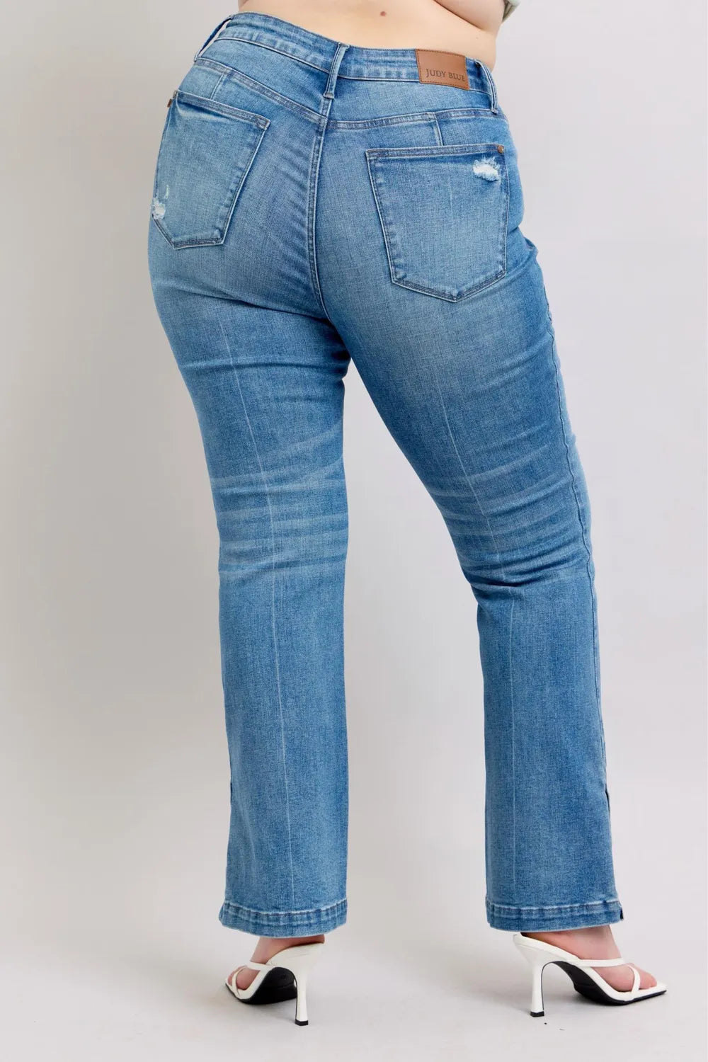 Image of Judy Blue HW Tummy Control Vintage Wash Side Slit Slim Boot Jeans | Queeble.shop